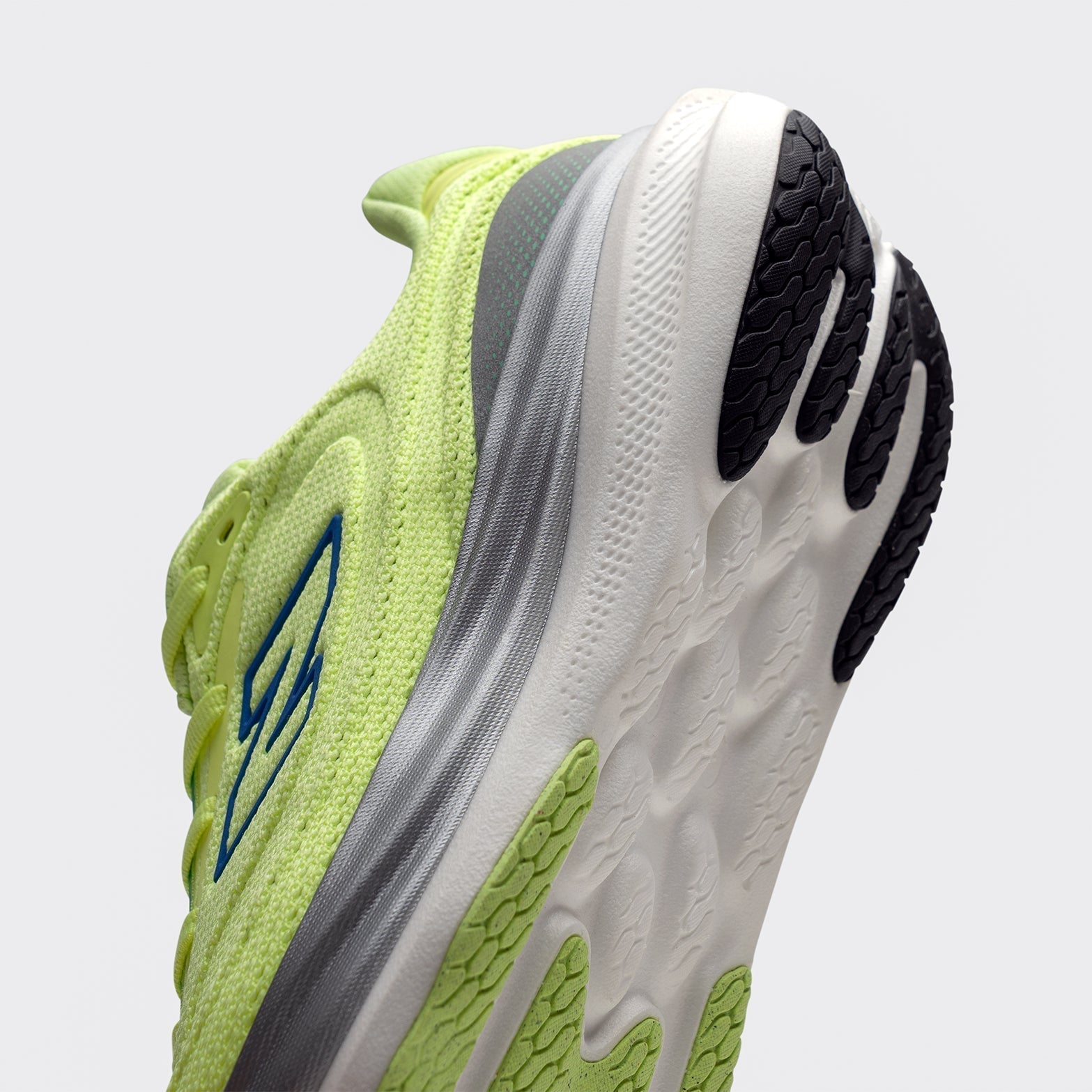 New Balance 1080v15 running shoe shown from side profile and sole view, displaying Infinion midsole technology and rubber outsole