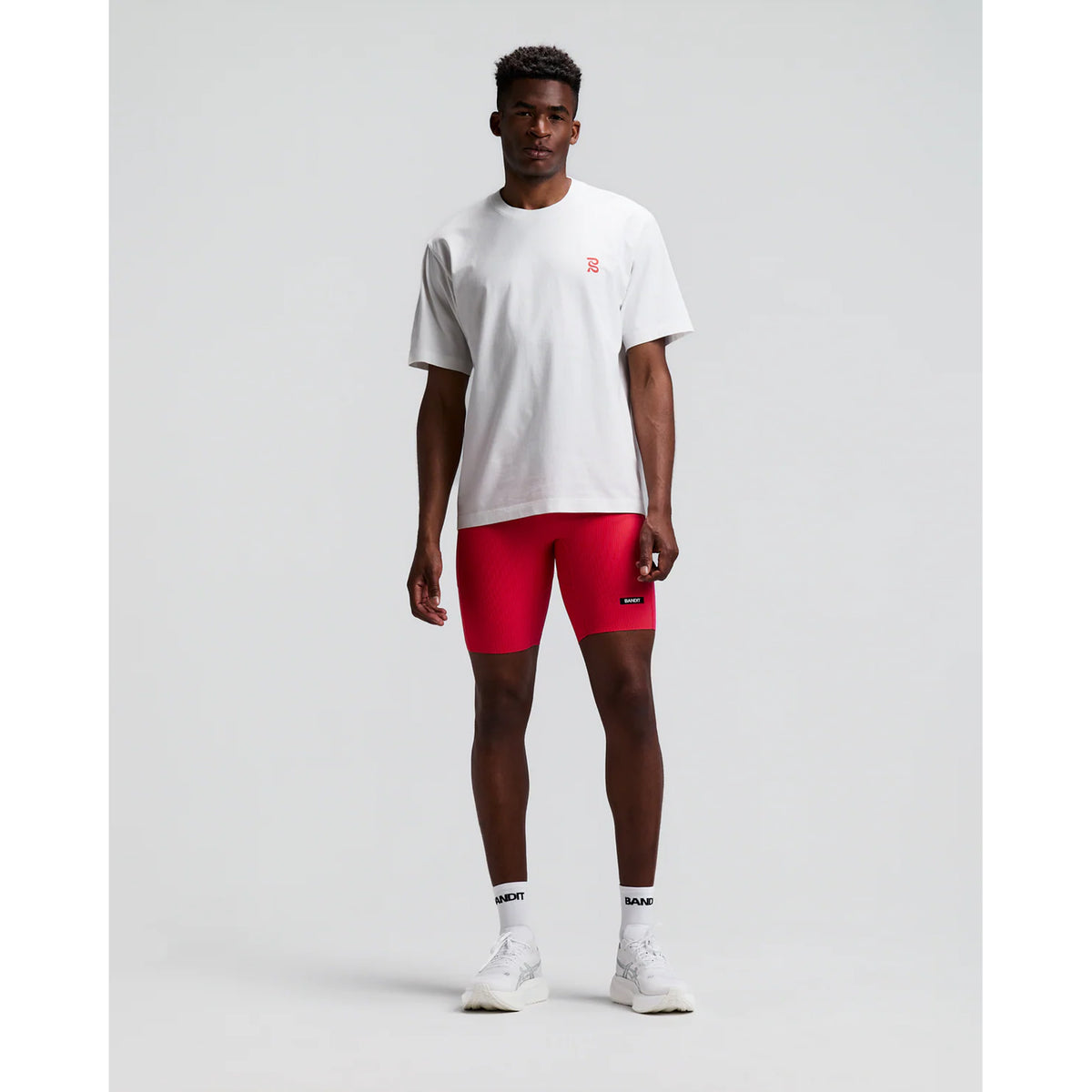 Bandit Cotton Tee Karel Crosshatch Current front full body view on model showing relaxed fit 100% combed cotton with Karel Crosshatch graphic design for comfortable everyday and post-run wear
