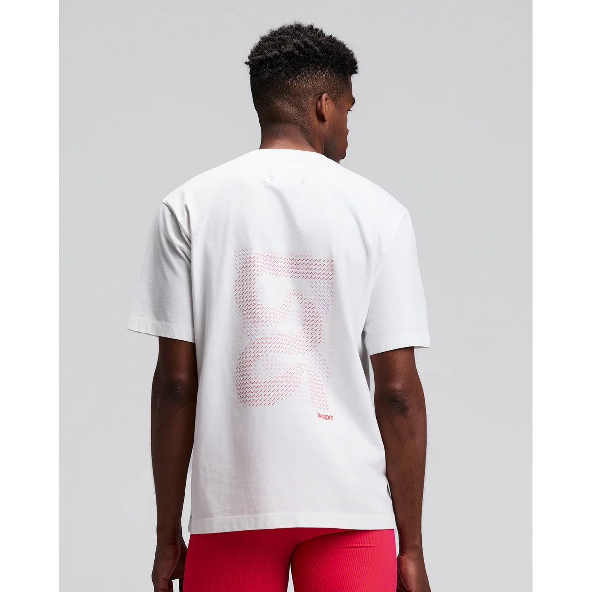 Bandit Cotton Tee Karel Crosshatch Current back view on model showing relaxed combed cotton construction with Karel Crosshatch graphic for post-run and casual wear