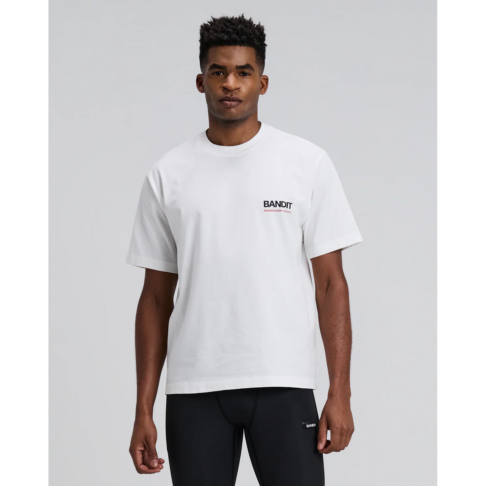 Bandit Cotton Tee Twisted City unisex in White — front view showing relaxed fit silhouette, Twisted City graphic print and 100% combed cotton construction