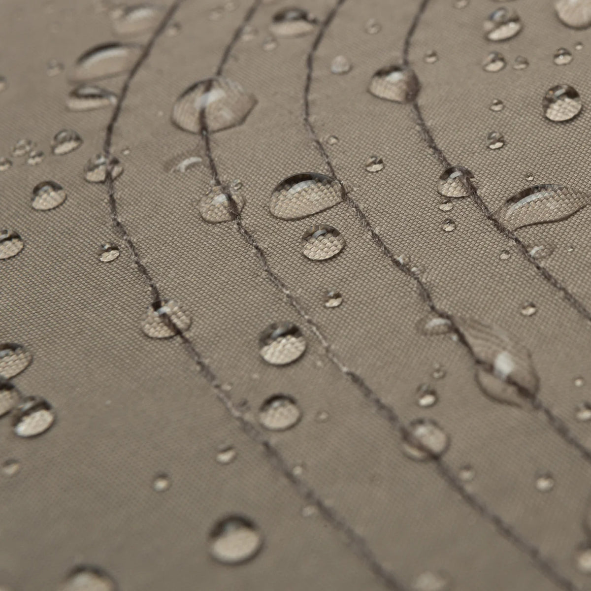 Satisfy FliteSilk™ 5 Panel Pinch Cap in Falcon Embroidery — closeup showing water-repellent FliteSilk™ Italian nylon fabric texture with water droplets demonstrating wind and water-repellent properties