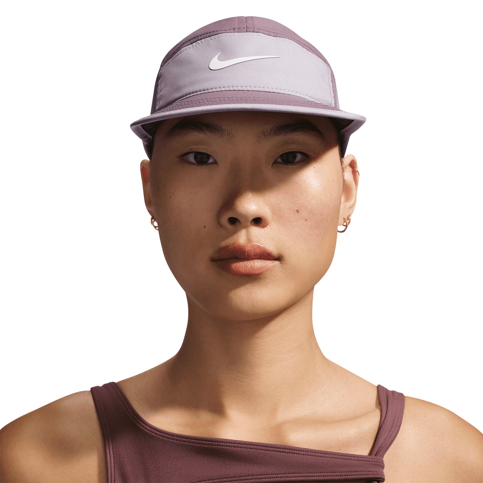Nike Fly Unstructured Swoosh Cap Tattoo LT Violet Ore Sea Glass front view showing 5-panel low-depth design with curved bill and Swoosh logo