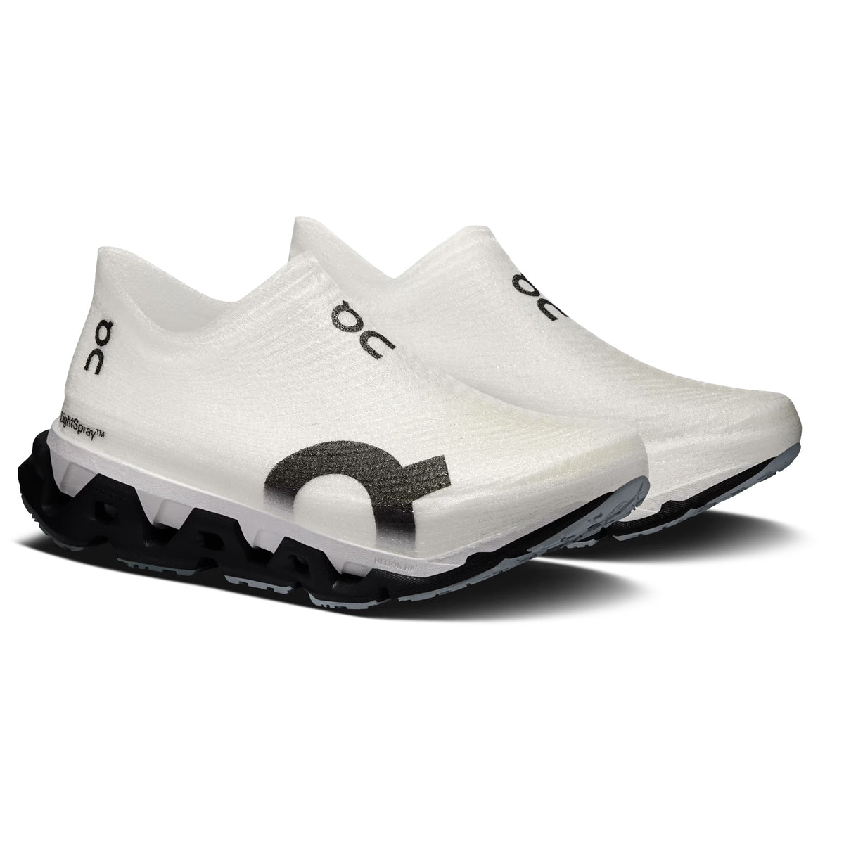 On Cloudmonster 3 Hyper LS women's running shoe in Black / Apollo — angled side view showing black LightSpray™ seamless upper, enhanced rocker shape and apollo CloudTec® dual-layer Helion™ HF hyper foam midsole stack