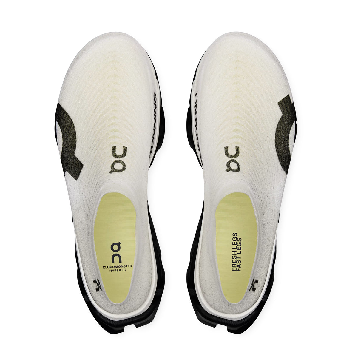 On Cloudmonster 3 Hyper LS women's running shoe in Black / Apollo — top-down view showing black LightSpray™ seamless one-piece upper with sock-like fit and lace closure with apollo detailing