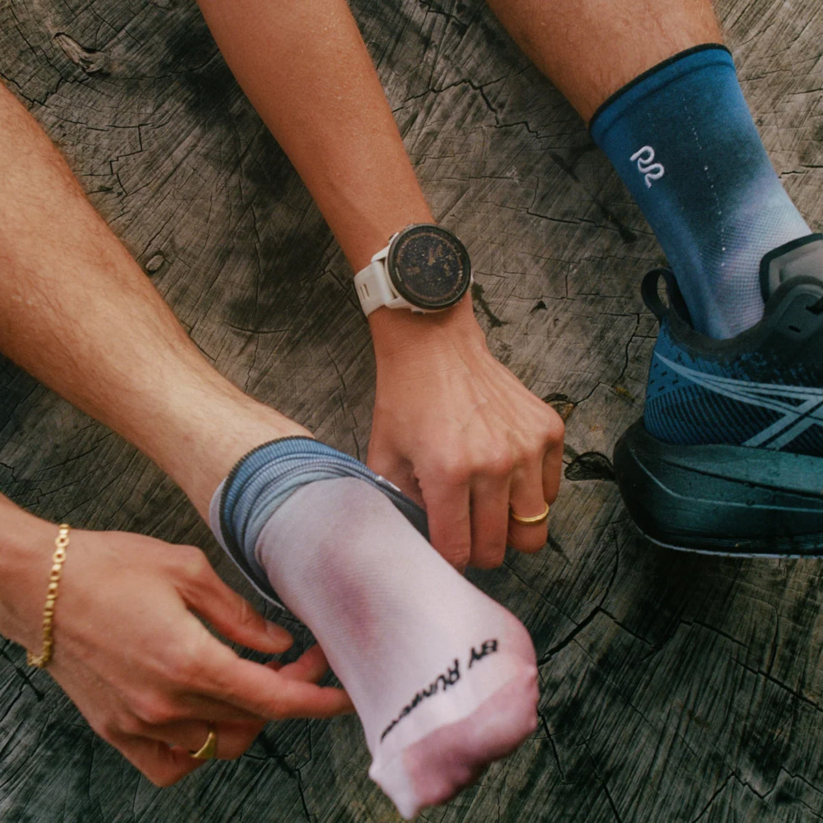 Bandit Lite Run™ Quarter Socks 2 Pack in Flow State Aegean Multi — lifestyle shot worn on model showing quarter-length silhouette, ribbed ankle detail and flow state aegean multi colourway