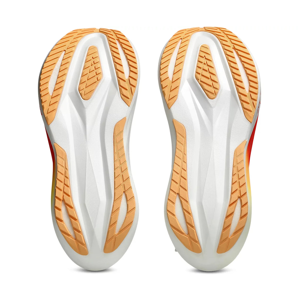 Two athletic shoe soles viewed from below, featuring white midsoles crafted with FF TURBO foam for enhanced energy return and tan rubber outsoles with geometric tread patterns for traction, displayed on a white background—exemplifying the performance-driven design of the Megablast Running Shoes White / Orange Glow.