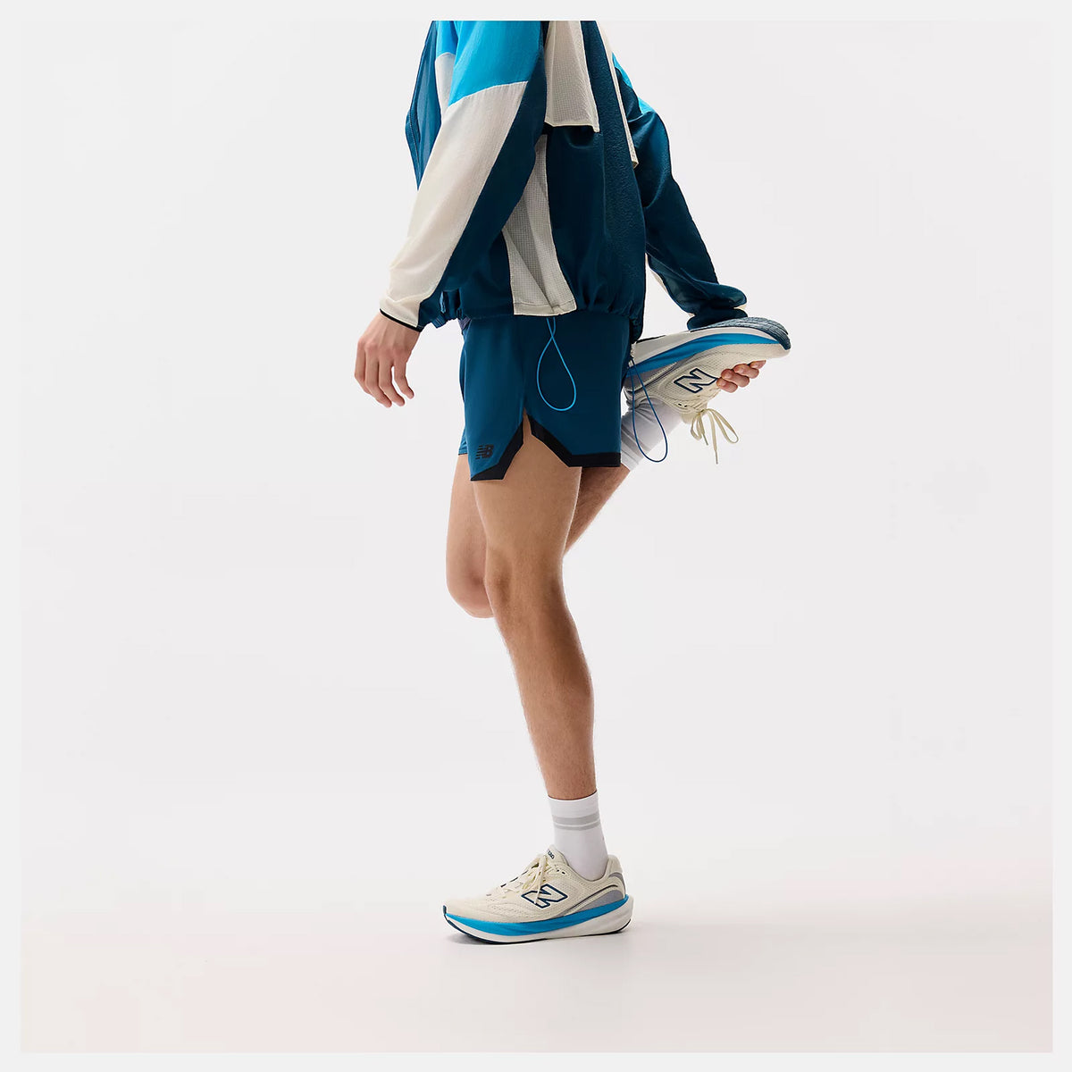 Men's New Balance 1080v15 Running Shoes Angora Altitude side view on male runner showing Infinion midsole technology with perforated mesh upper for enhanced cushioning and energy return during daily training