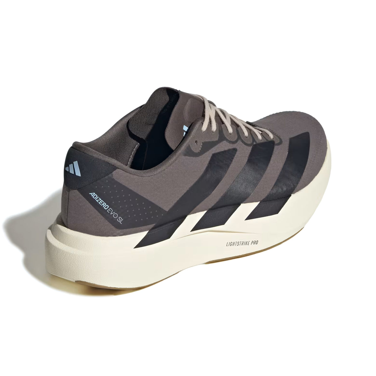 A men’s Adidas Adizero EVO SL Woven H.Koumori Running Shoe in Charcoal, Night Grey, and Clear Sky, featuring black stripes, a cream-colored thick sole with LIGHTSTRIKE PRO technology, and “Adizero Evo 1” and “Lightstrike Pro” text on the side, viewed at an angle.