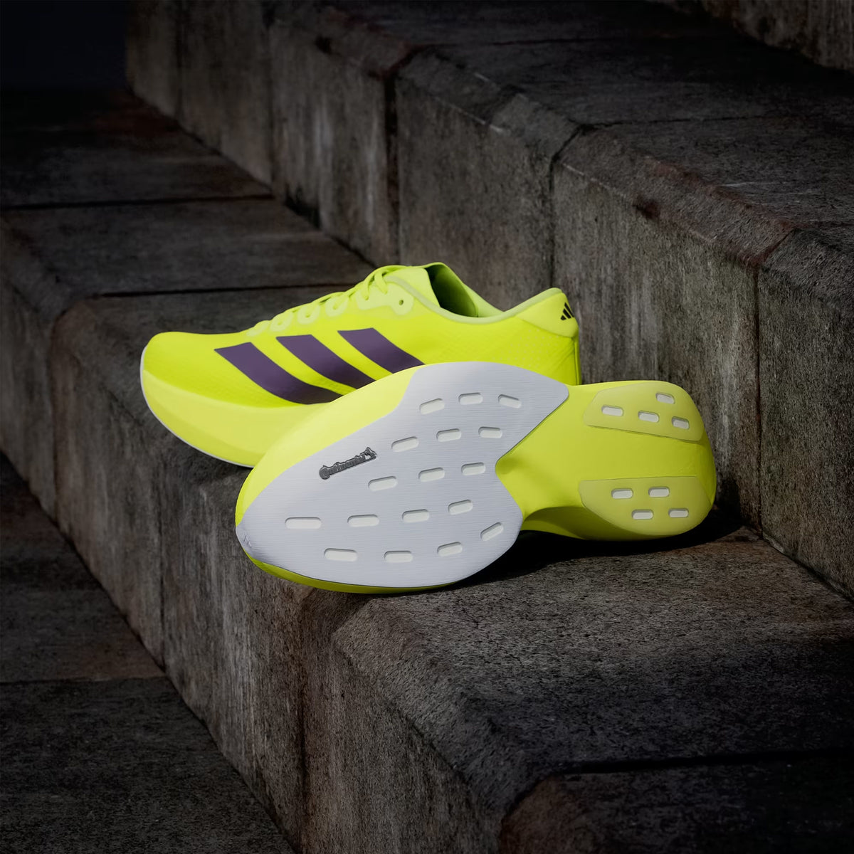 Men's adidas Adizero EVO SL Woven Running Shoes Solar Yellow Aurora Plum Powder Plum showing Continental rubber outsole