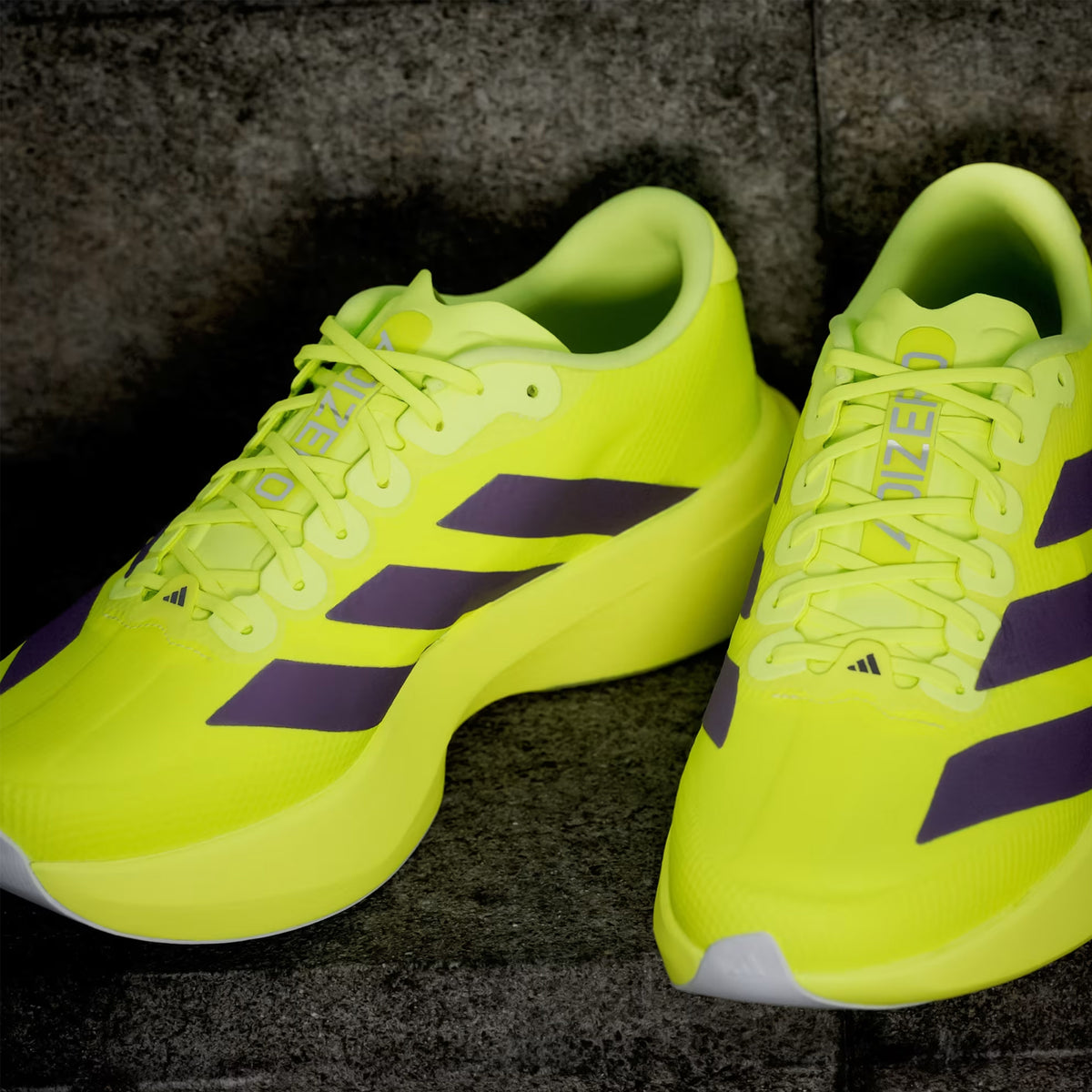 Men's adidas Adizero EVO SL Woven Running Shoes Solar Yellow Aurora Plum Powder Plum showing top view of synthetic and textile woven upper