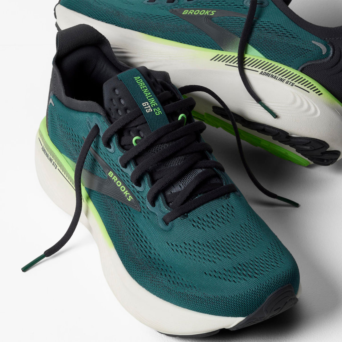 Men's Brooks Adrenaline GTS 25 Running Shoes Dark Green front view stacked sideways showing DNA LOFT cushioning stack height and engineered mesh upper construction