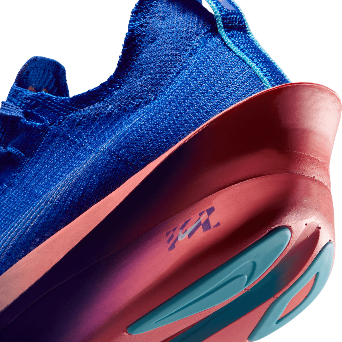 Men's Nike Alphafly 3 Running Shoes Racer Blue Atomic Pink Indigo Burst White angled side and heel view showing carbon-plated ZoomX foam with dual Air Zoom units for elite racing from 5K to marathon