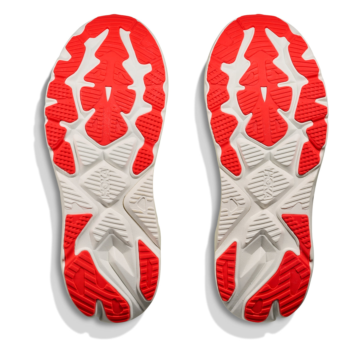 Two athletic shoe soles are displayed side by side, featuring a white base accented with neon yuzu and neon flame rubber sections that form a bold, angular tread pattern. Engineered for optimal support as a stability shoe, the HOKA Men’s Arahi 8 Running Shoes cast subtle shadows against a clean white background.