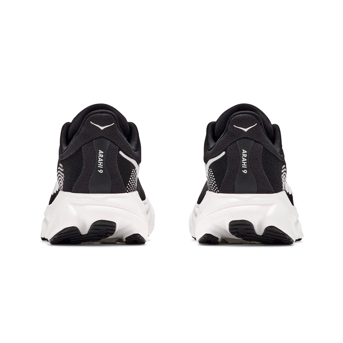 Men's HOKA Arahi 9 Wide Fit Running Shoes Black White heel view showing dual-density compression moulded EVA foam with H-Frame stability technology and wide fit construction for cloud-like cushioning