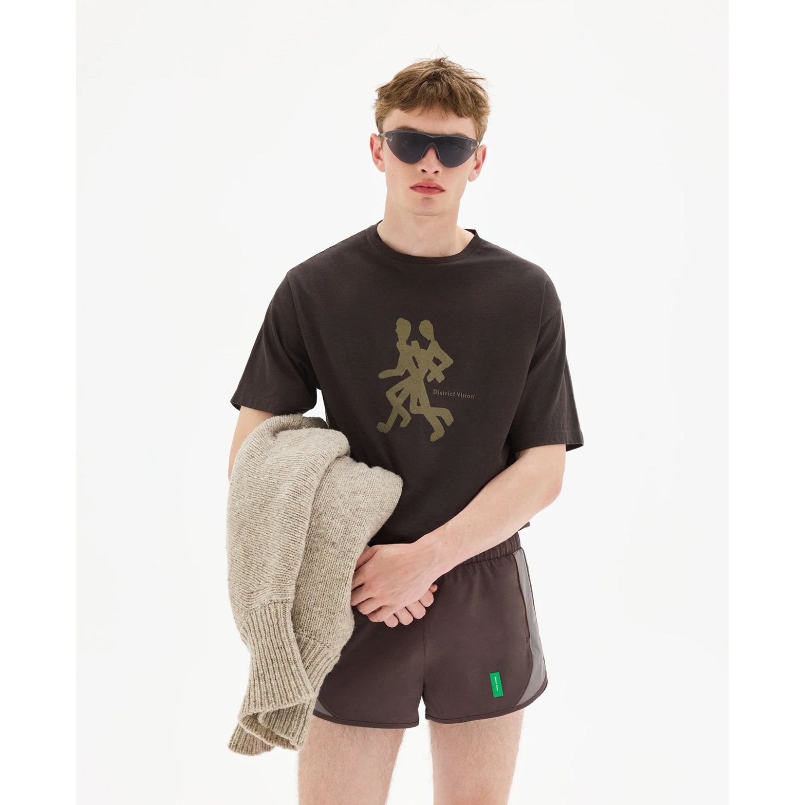 District Vision California Cotton Tee men's in Runners Deep Brown — front view worn on model showing relaxed fit, Runners graphic print and deep brown pigment dye stone wash cotton drape