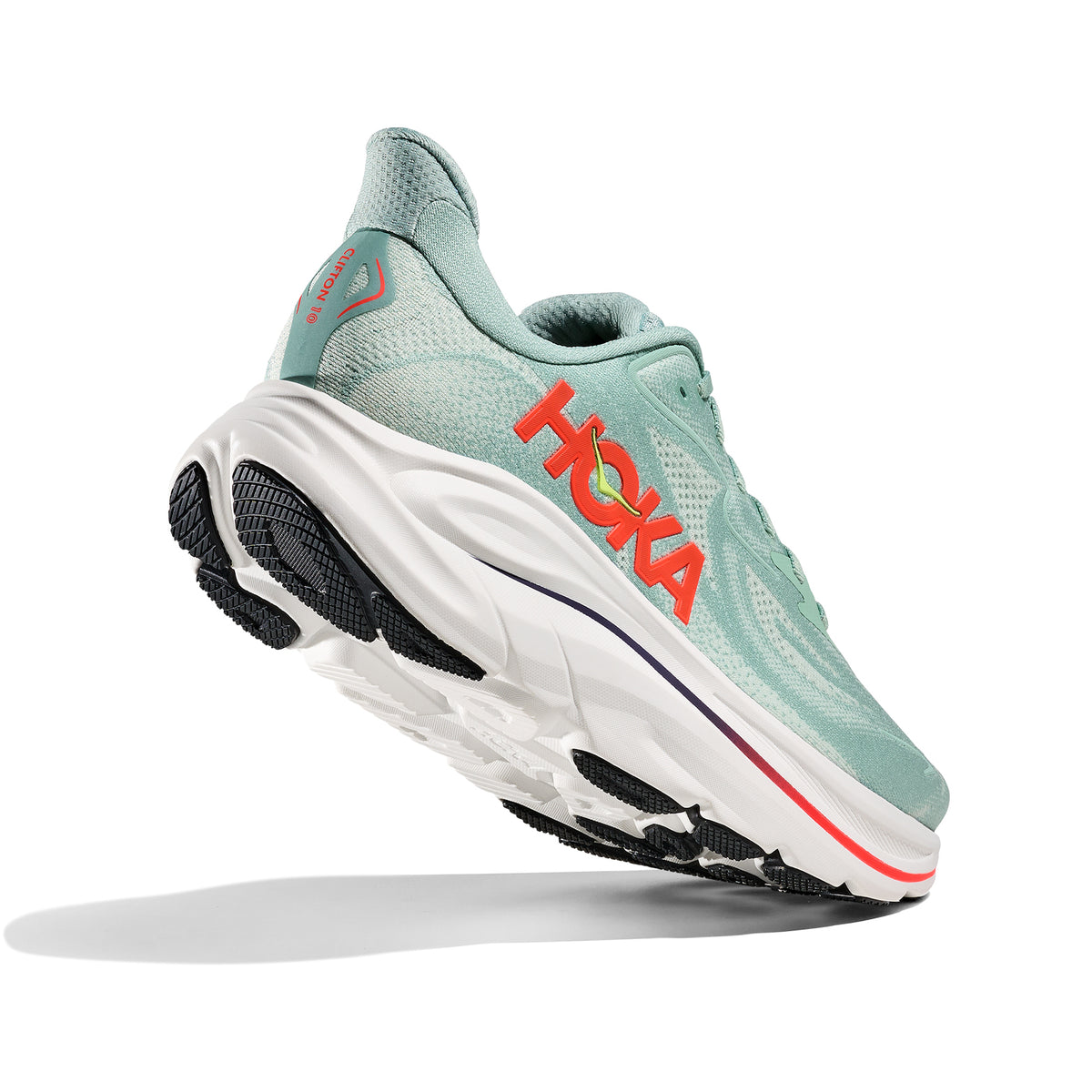 HOKA Clifton 10 men's running shoe in Sage / Neon Flame — angled rear view showing MetaRocker heel geometry, Active Foot Frame construction and neon flame orange heel detailing