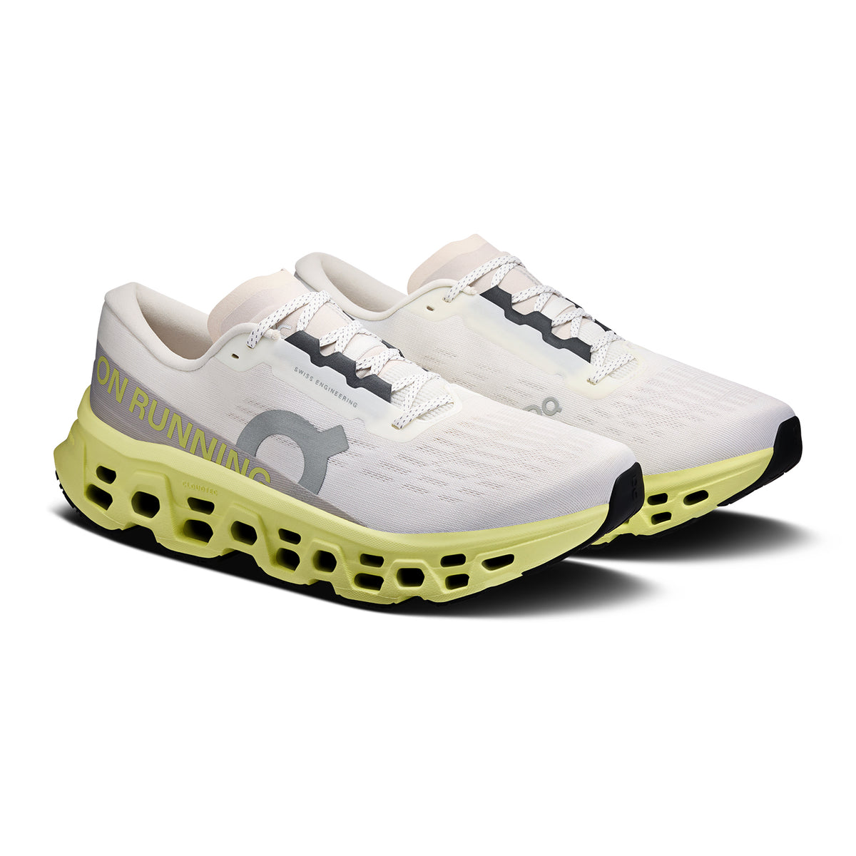 Men's On Cloudmonster 3 Running Shoes Ivory Limelight angled side view showing CloudTec technology, carbon-infused Speedboard propulsion and engineered mesh upper for maximum cushioned daily running