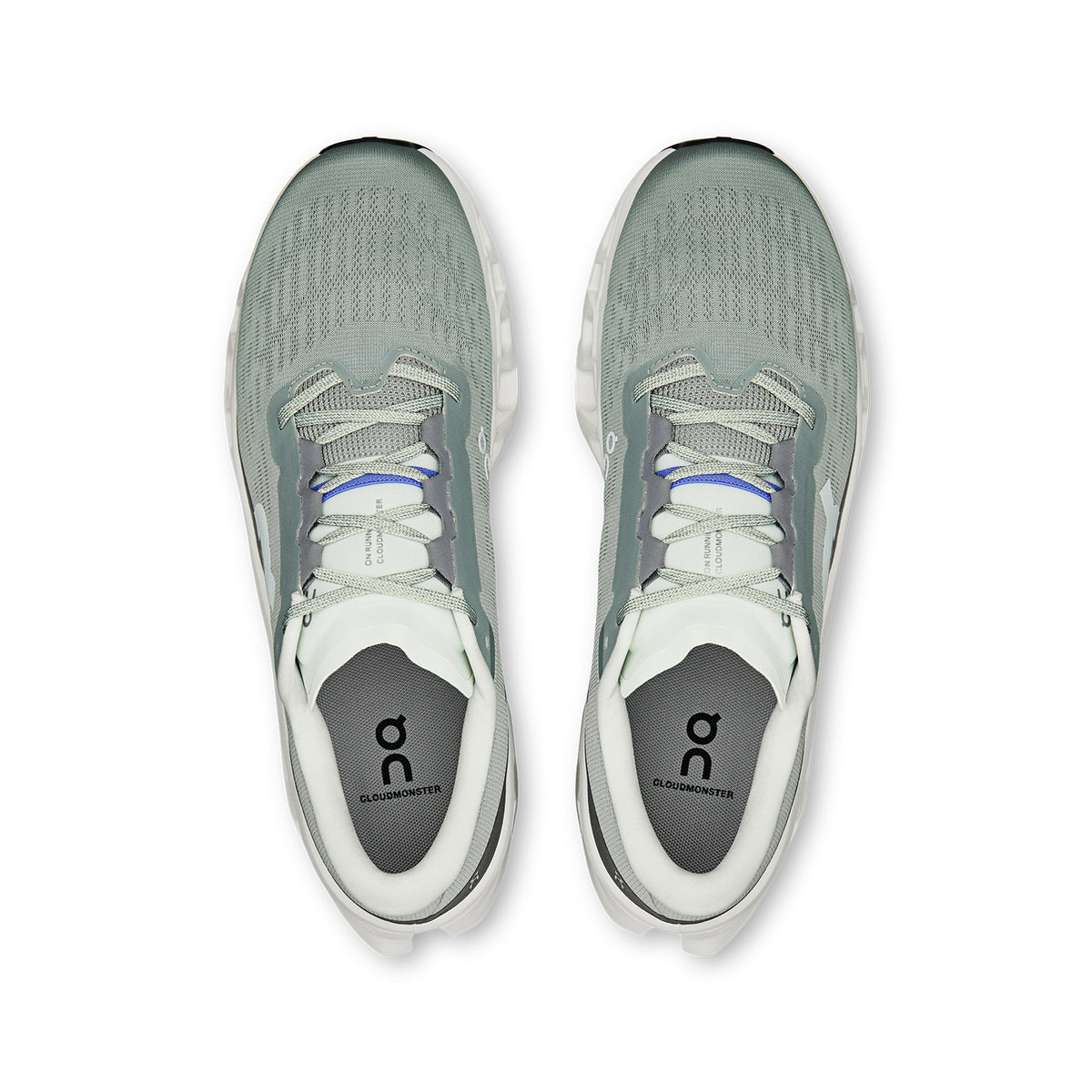 On Cloudmonster 3 men's running shoe in Tin / Ivory — top-down view showing tin grey engineered knit upper with breathability zones, enhanced tongue construction and lace closure with ivory detailing