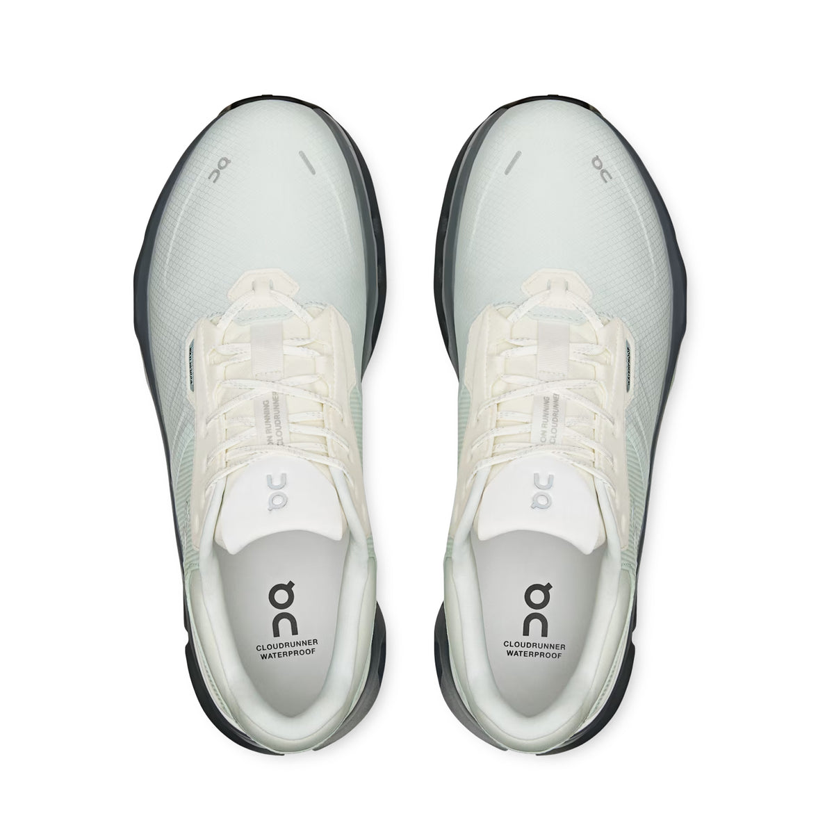 Top view of a pair of On Men’s Cloudrunner 2 Waterproof Running Shoes in Iceberg / Rock with white laces. The insoles display the On and Cloudrunner Waterproof logos. These all-weather running shoes feature black soles, CloudTec cushioning, and a clean, minimalist design for stable performance in any conditions.