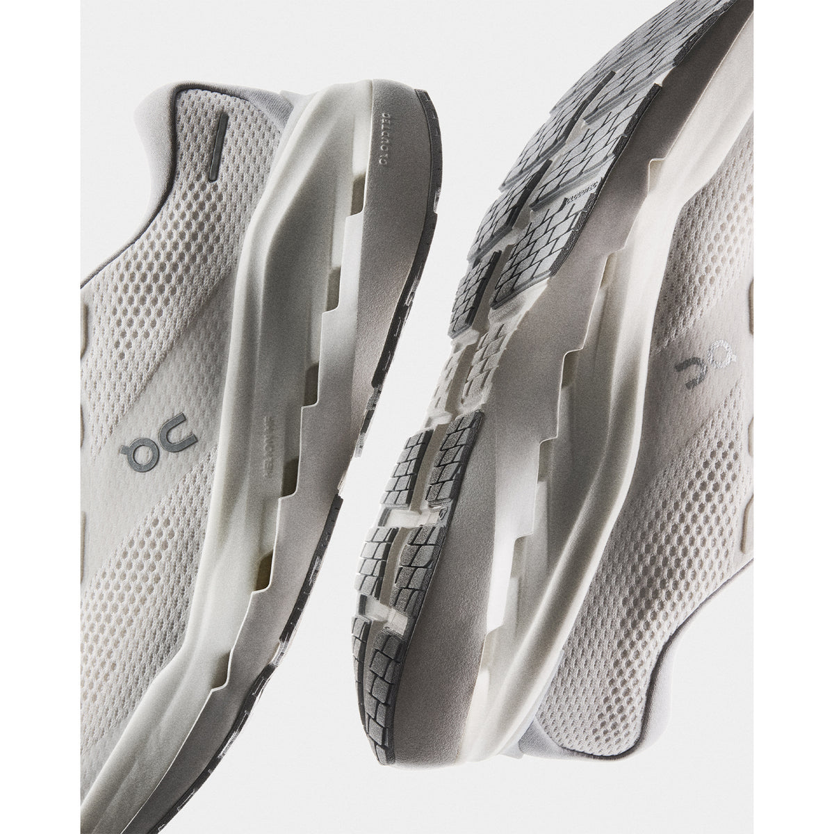 Men's On Cloudrunner 3 Max Running Shoes White Glacier angled side and heel view showing stability-engineered CloudTec with Helion HF hyper foam, wide base and high sidewall cupping for fluid balanced daily road running