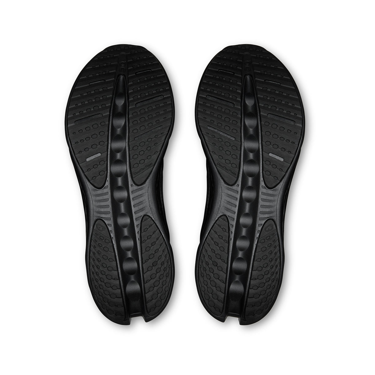 The soles of two Men’s Cloudsurfer 3 Running Shoes Black / Black, showing the textured CloudTec Phase tread pattern and recessed channels.