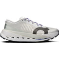 Men’s Cloudultra Pro Trail Running Shoes by On in Ivory/Iceberg feature a thick, cushioned sole, durable black outsole, breathable mesh upper for lightweight support, blue-speckled laces, and a bold black O graphic on the side—perfect for conquering mountain trails.