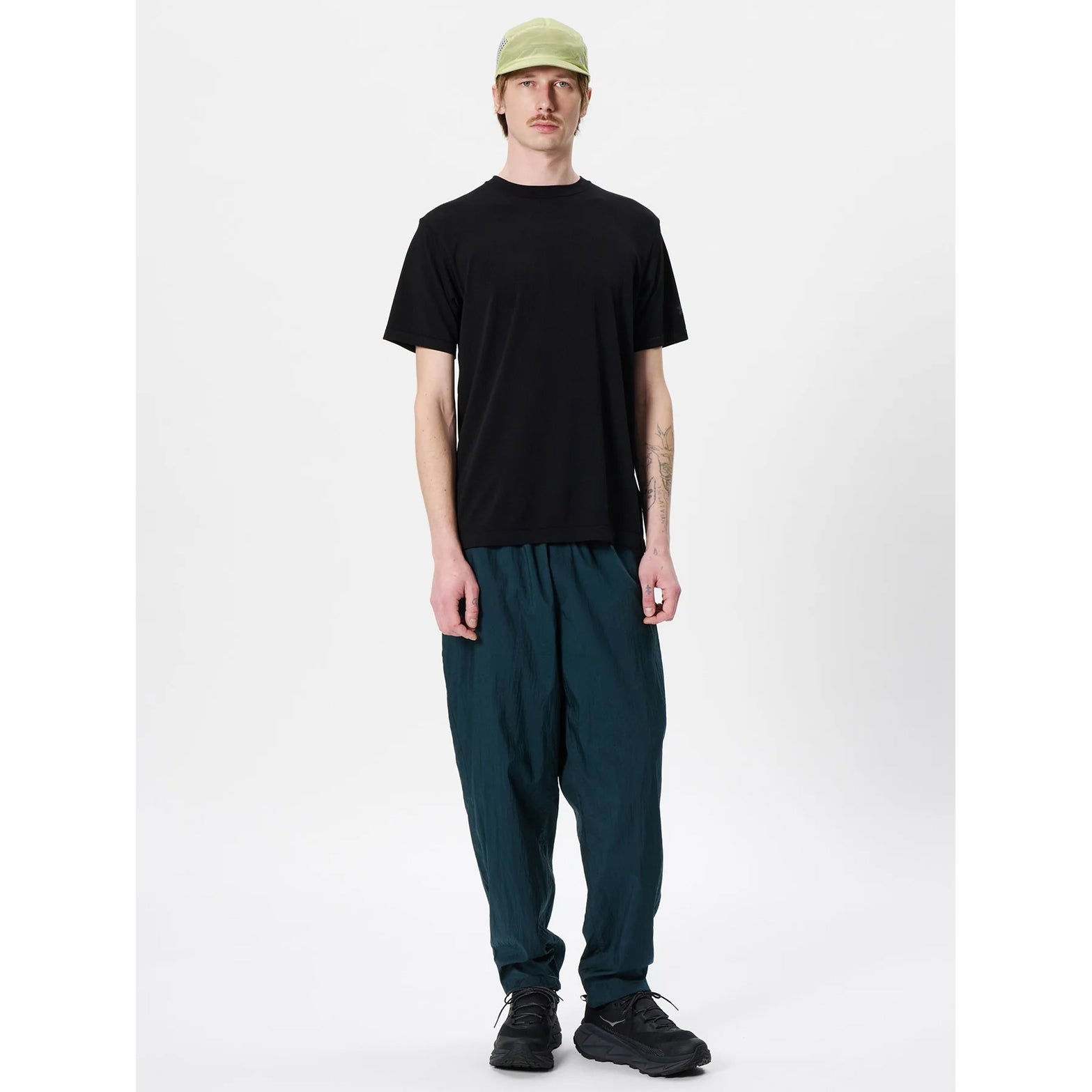 Goldwin Men's Convexity Dry Tee full body view on male model showing soft textured knit with excellent elasticity for unrestricted movement