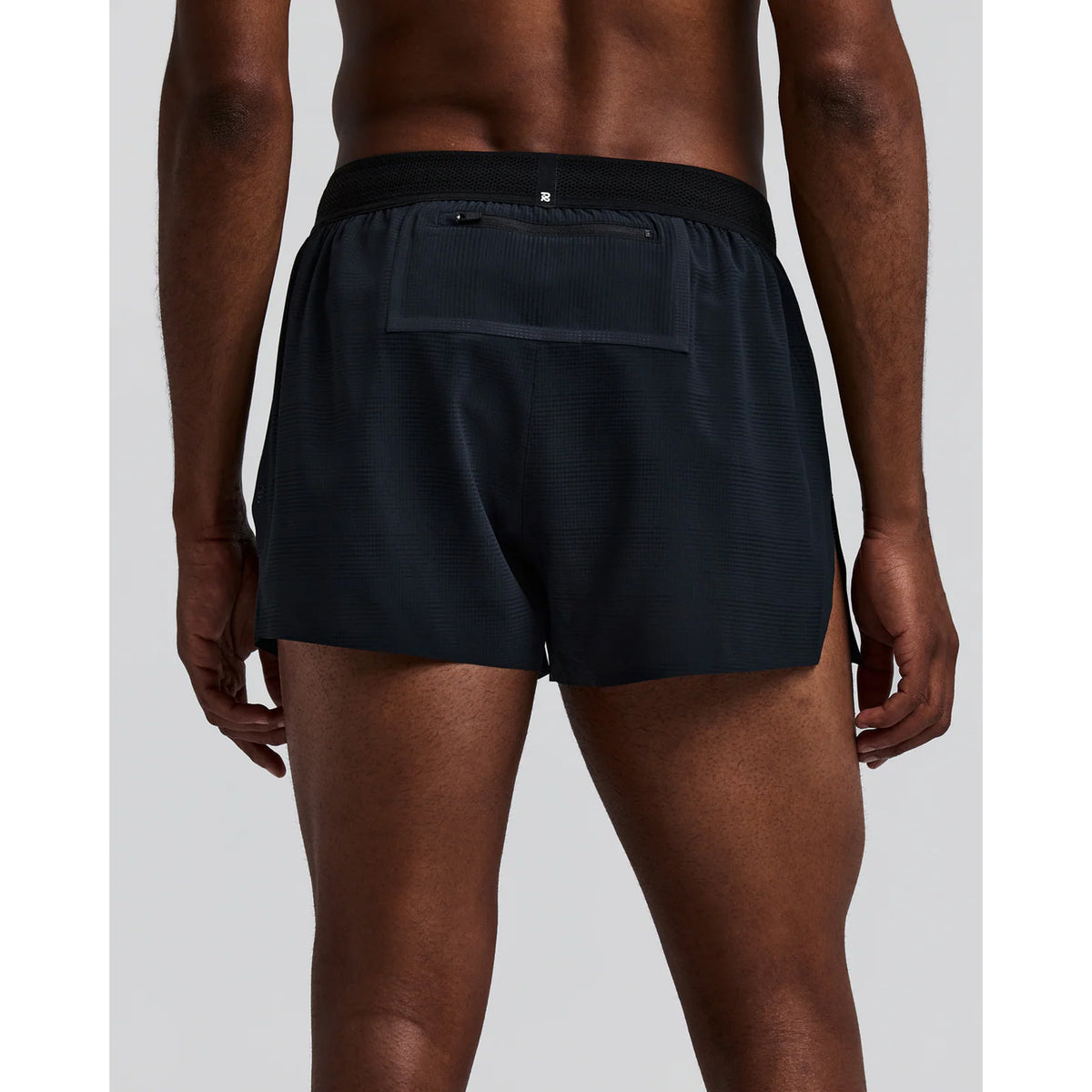 Men's Bandit CoolGrid 3 Inch Split Shorts Black back view on male runner showing reflective branding at centre back with CoolGrid breathable construction