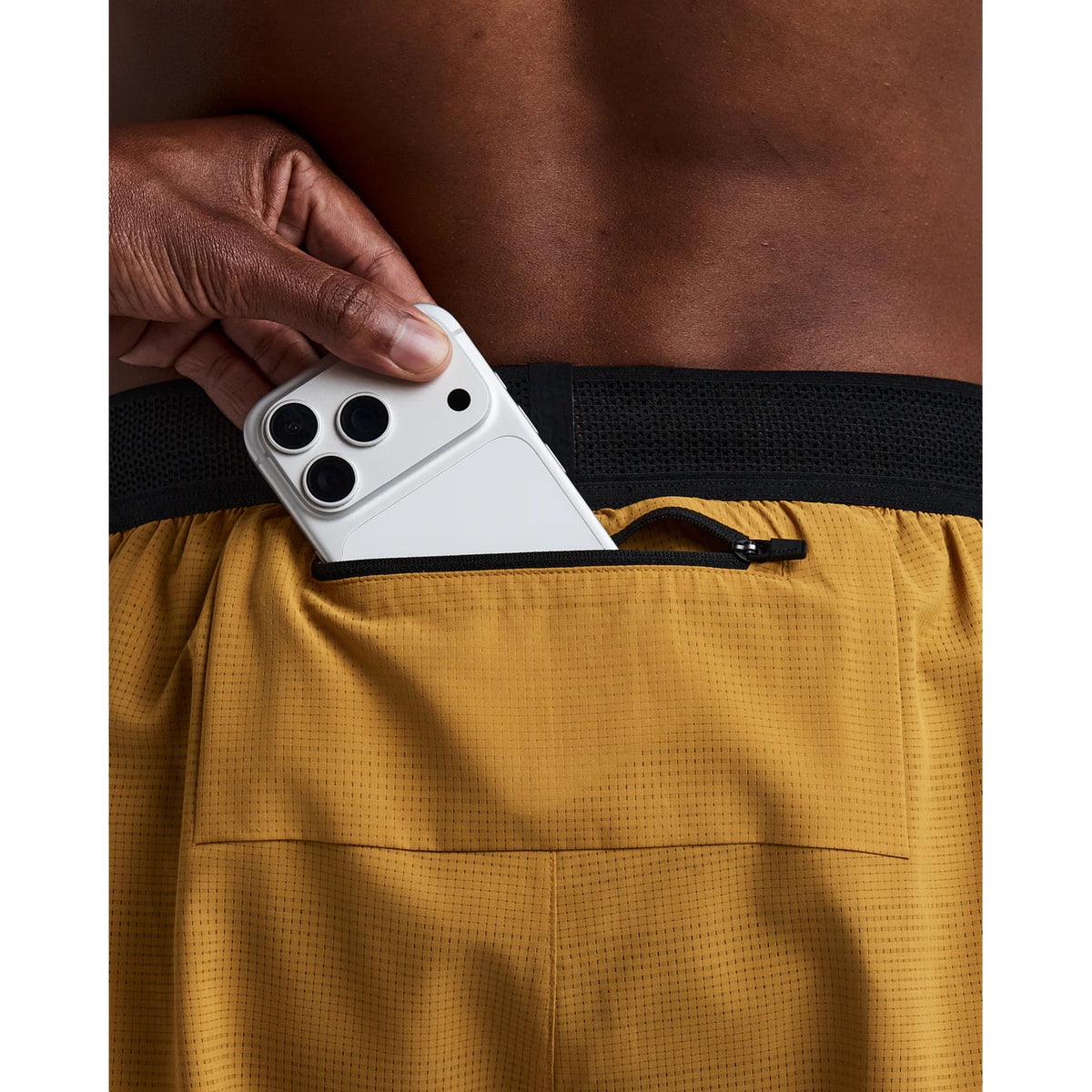 Men's Bandit CoolGrid 3 Inch Split Shorts Copal close-up of phone pocket