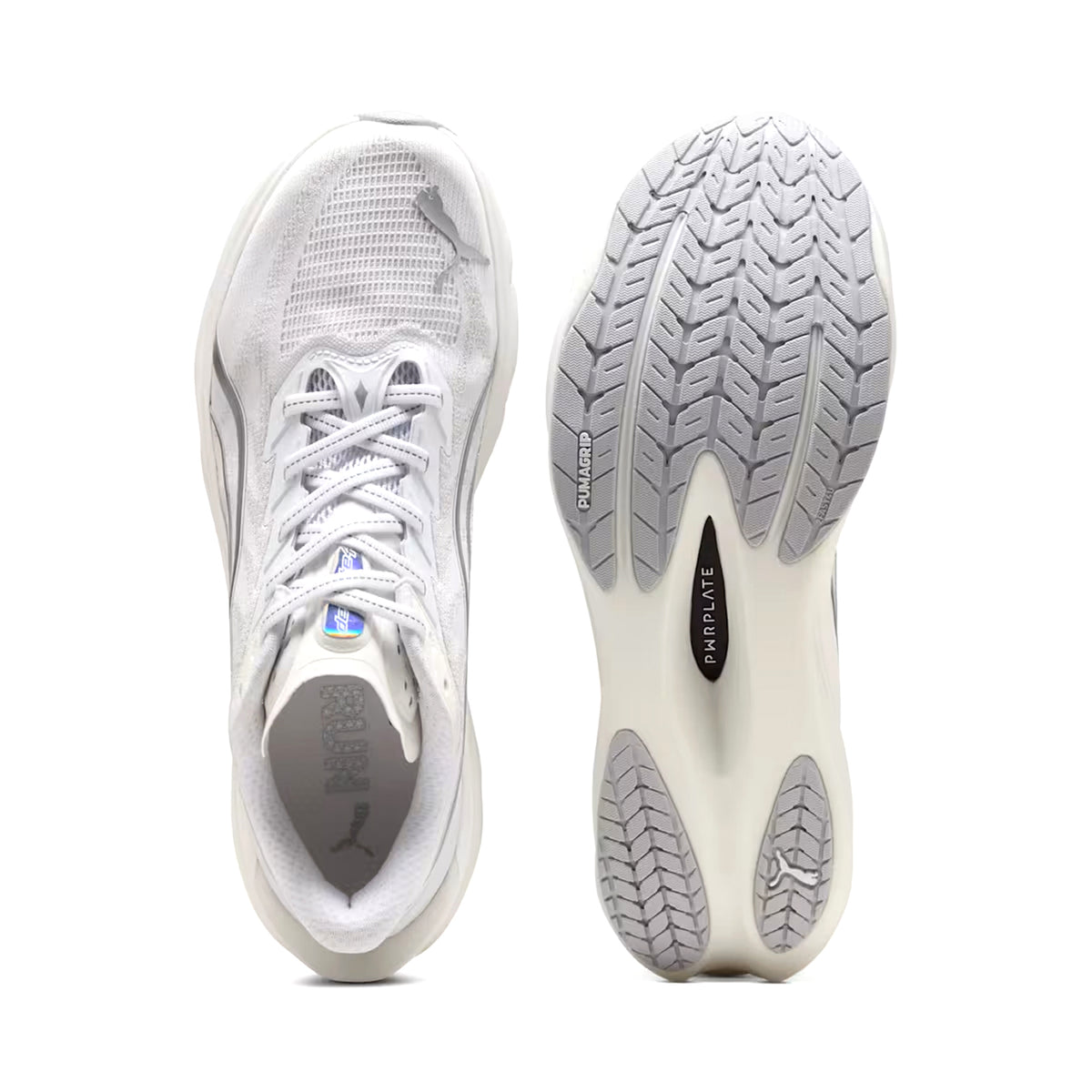 Top and bottom views of the Men’s Deviate NITRO 4 Running Shoes by Puma, shown in Puma White and Feather Grey with a mesh upper, laces, and a textured gray NITROFOAM rubber sole, displayed on a plain white background.