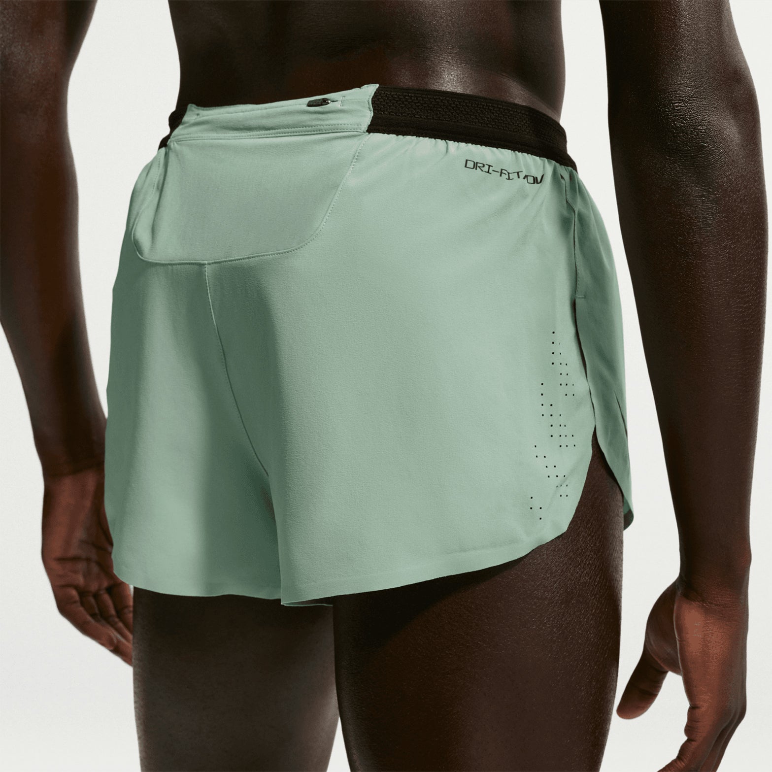 Men's Nike Dri-FIT AeroSwift ADV 2 Inch Running Shorts Steam Black back view on male runner showing zippered back pocket and non-reflective Swoosh logos for flash photography protection