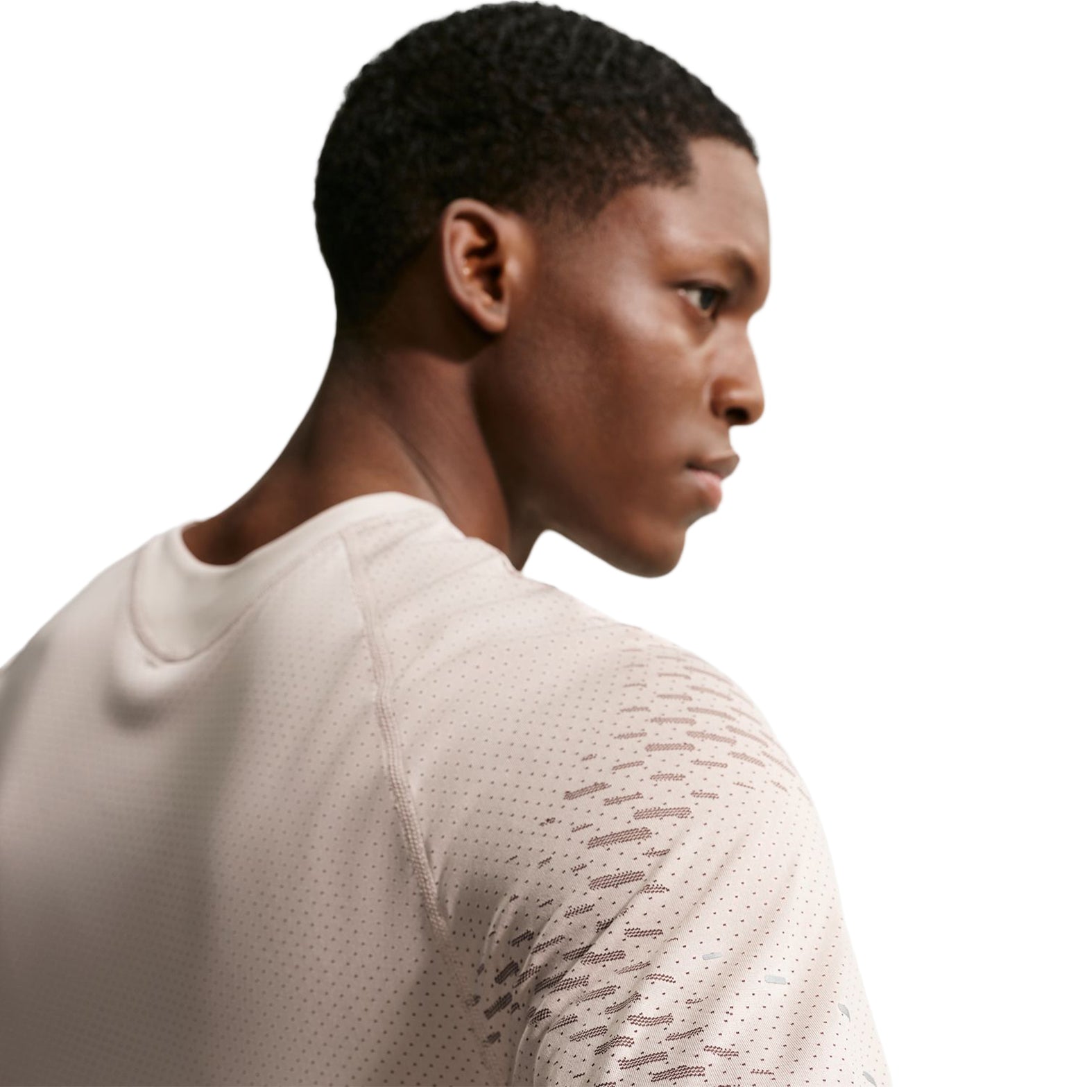 Nike Stride Dri-FIT ADV running top Cream II Mink Brown back shoulder closeup featuring raglan sleeve construction and reflective details