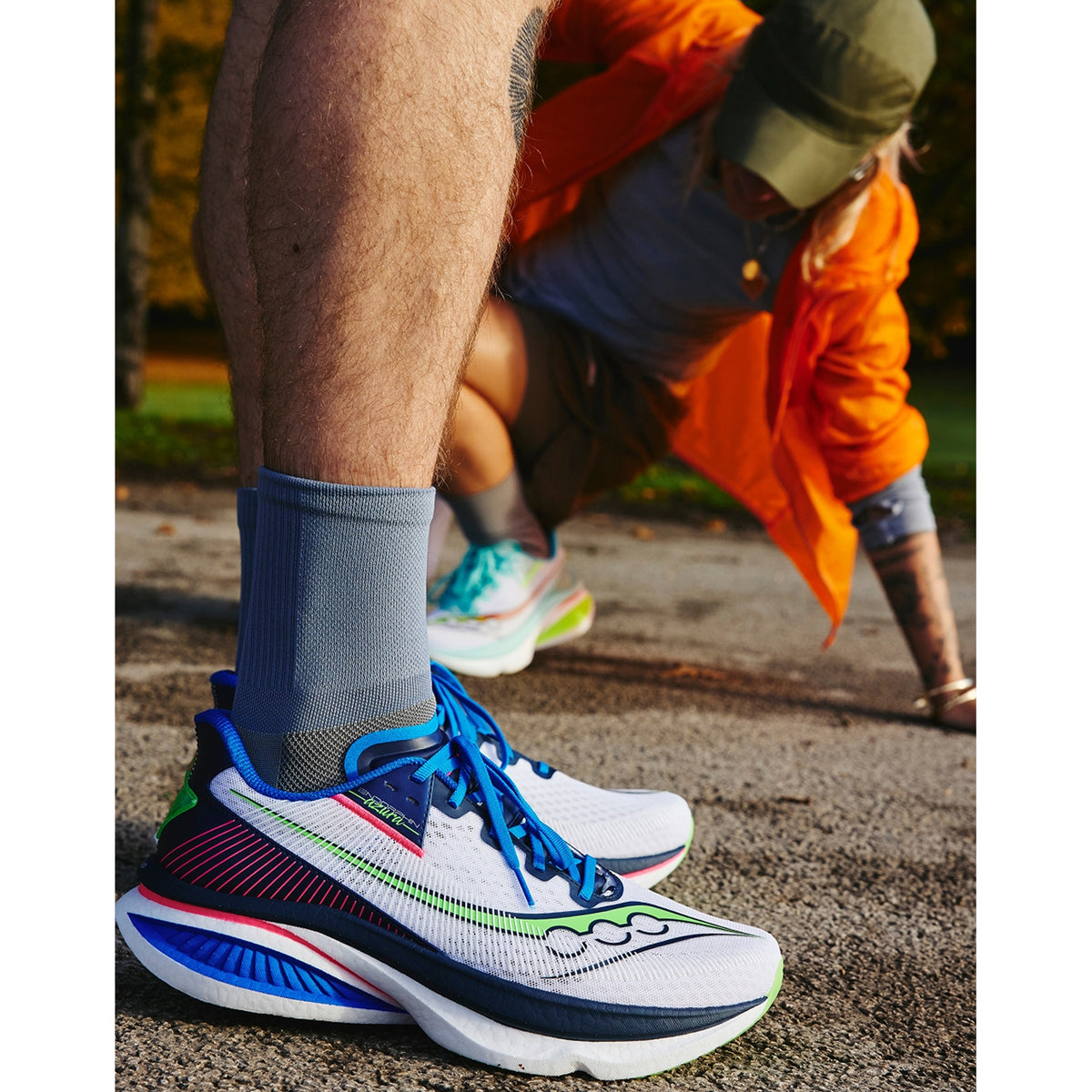 Men's Saucony Endorphin Azura Running Shoes worn by male runner showing fit and SpeedRoll midsole profile on road