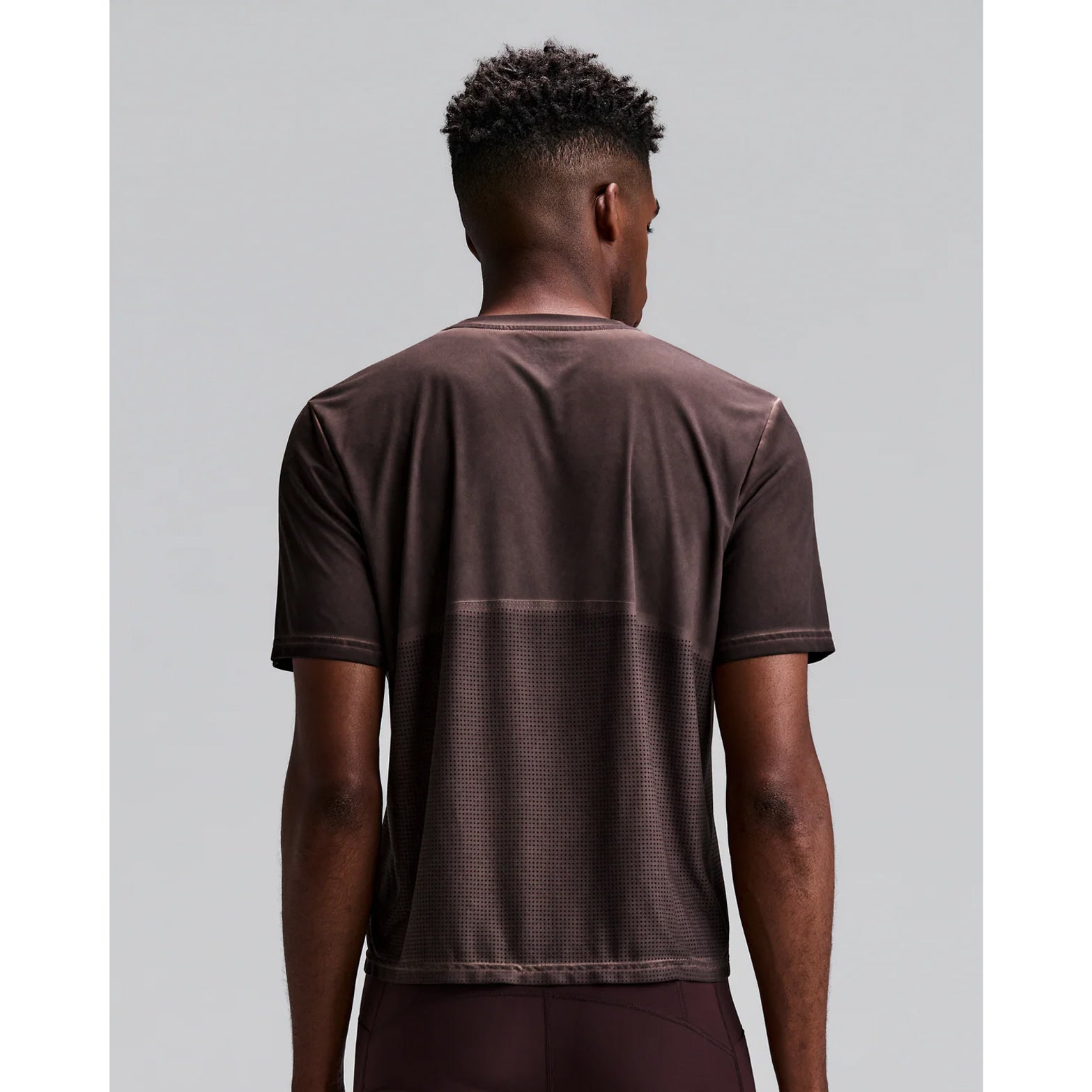 Men's Bandit FrioSoft Perforated Box Tee Espresso back view on male runner showing perforated panels with FrioSoft moisture-wicking fabric and SaltFade vintage finish for breathable running