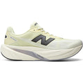 Men's New Balance FuelCell Rebel v5 Running Shoes Pistachio Butter Digital Mist outer side view showing FuelCell PEBA and EVA foam blend with geometric midsole design for propulsive energetic daily training