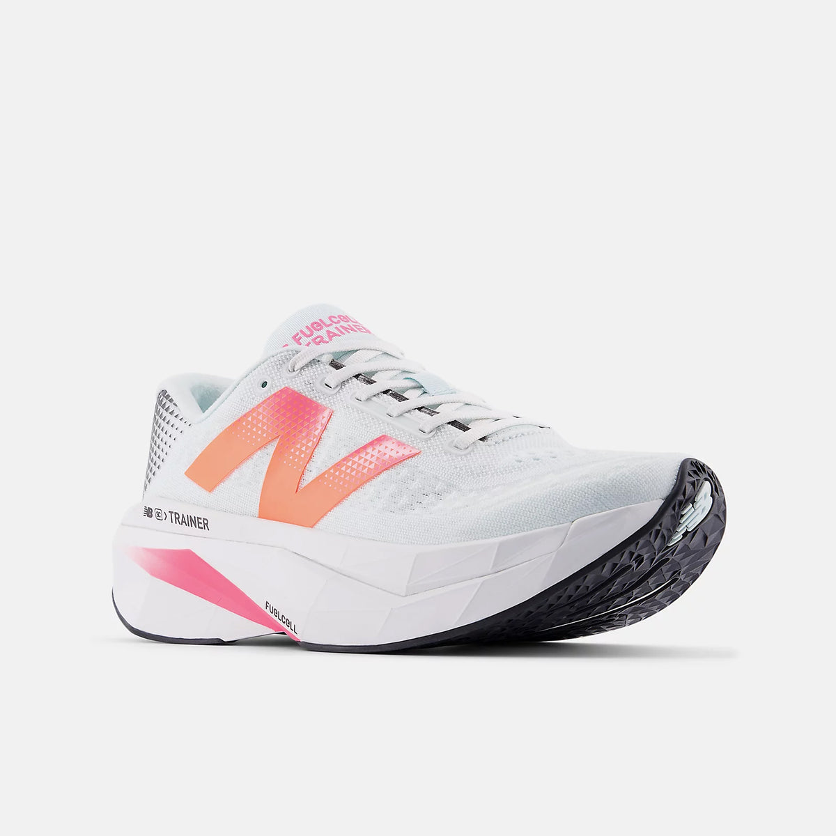 New Balance FuelCell SuperComp Trainer v3 men's running shoe in Fairweather Blue / Glint Blue — angled side view showing heel construction, Energy Arc carbon fibre plate profile and fairweather blue upper with glint blue midsole contrast