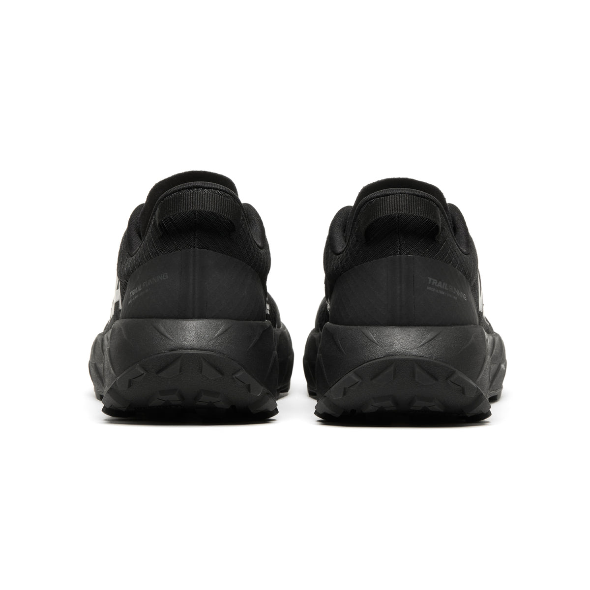 Back view of two Men’s Harpie Trail Running Shoes Black with thick, lugged TerraGrip outsoles.