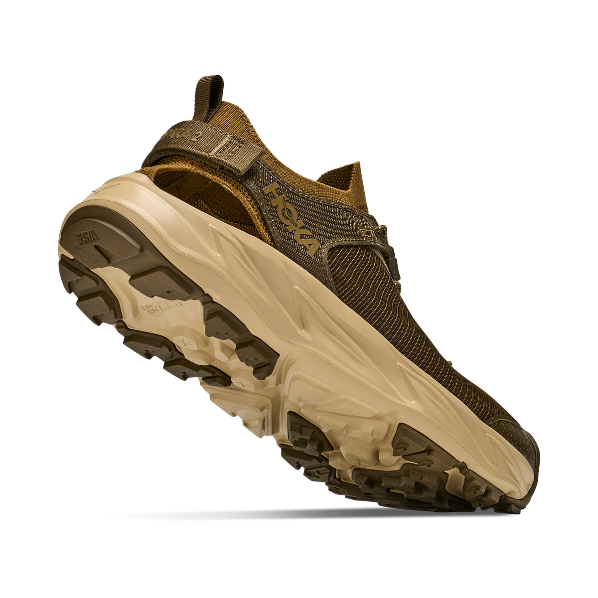 Men's HOKA Hopara 2 Sandal Sepia Barley angled side and heel view showing recycled knit upper with sugarcane EVA midsole, sticky rubber outsole and adjustable heel strap for mixed terrain and water crossings