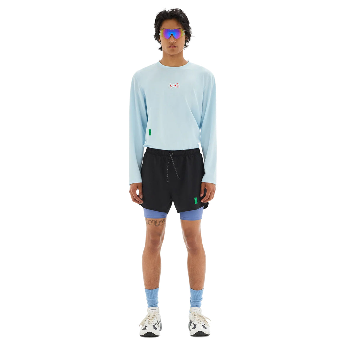 District Vision Men's Layered Training Shorts Black Race Blue full body view on male runner showing 3-inch split short with deep side splits for increased airflow and ease of motion
