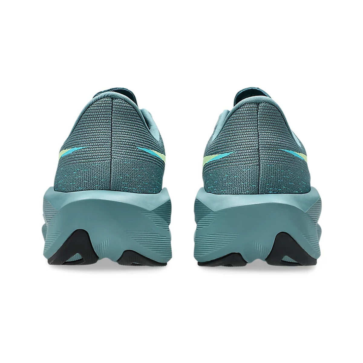 A pair of Men’s Novablast 6 Running Shoes in Foggy Teal and Illuminate Yellow are viewed from the back, displaying thick, textured soles and a subtle striped design on the heel that suggests impressive energy return.