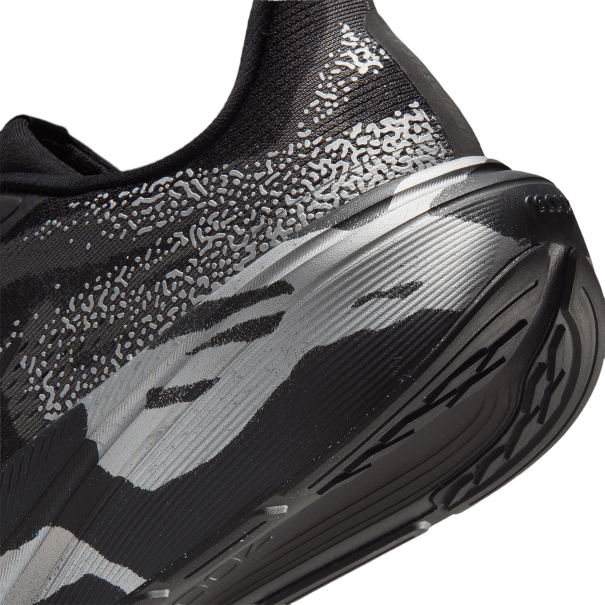 Nike Pegasus 42 men's running shoe in Black / Medium Ash / Metallic Silver — angled side view showing black lightweight mesh upper, medium ash and metallic silver accent detailing and full-length curved Air Zoom ReactX midsole profile