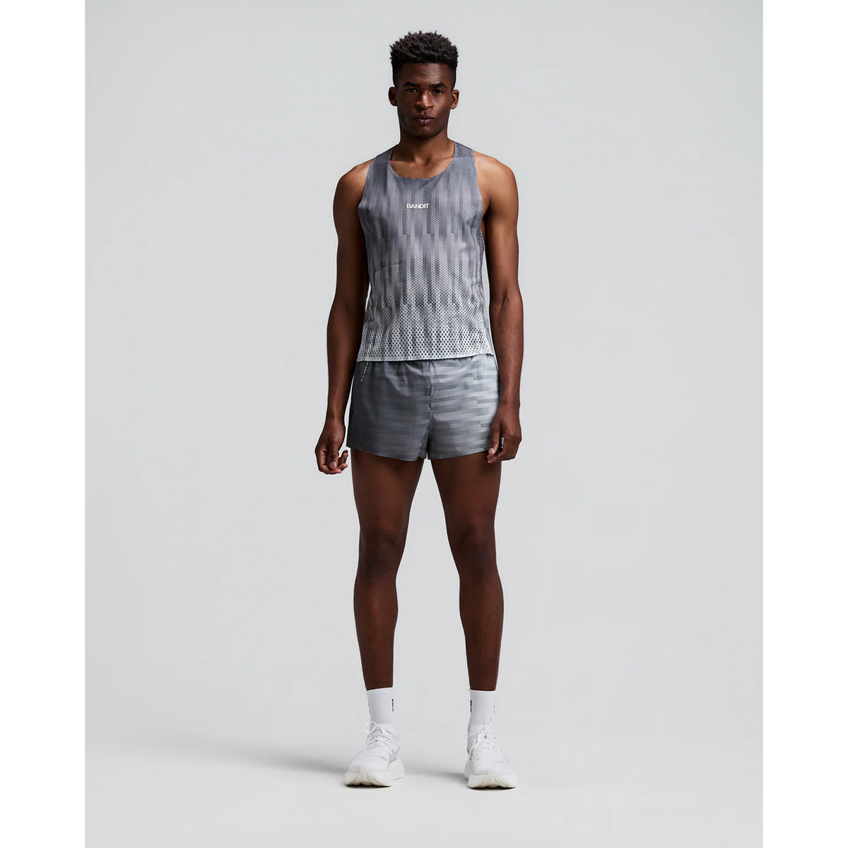 Men's Bandit Shredder Shorty Race Singlet Uneven Gradient Plaster front full body view on male runner showing cropped gradient mesh singlet with high neckline and bonded seams for race day performance