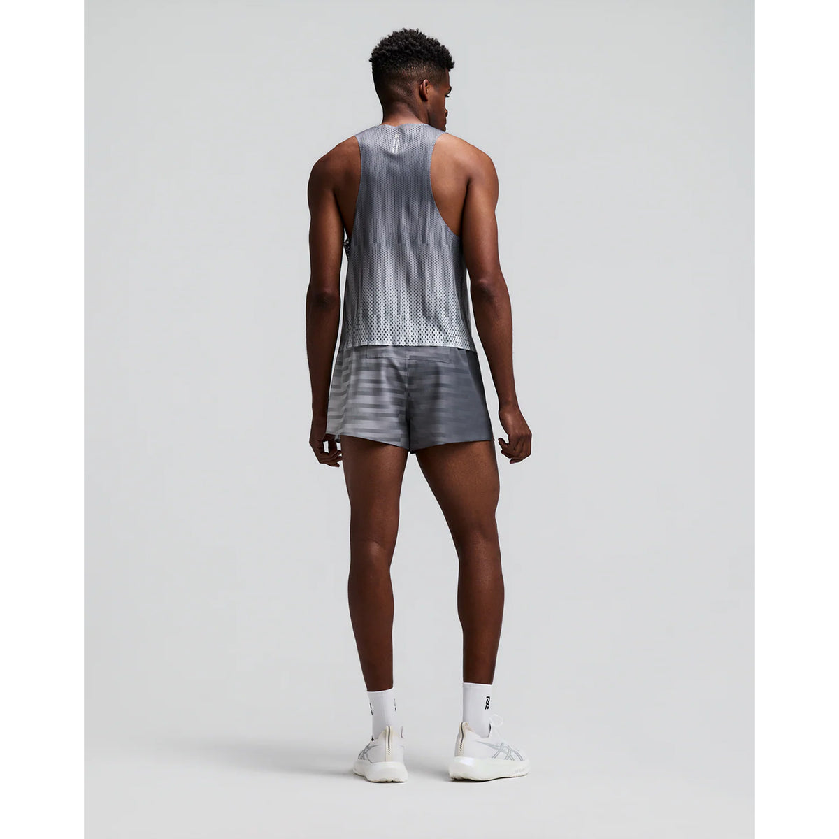 Men's Bandit Shredder Shorty Race Singlet Uneven Gradient Plaster back full body view on male runner showing racer back design with side hem slits and reflective branding for breathable race day running