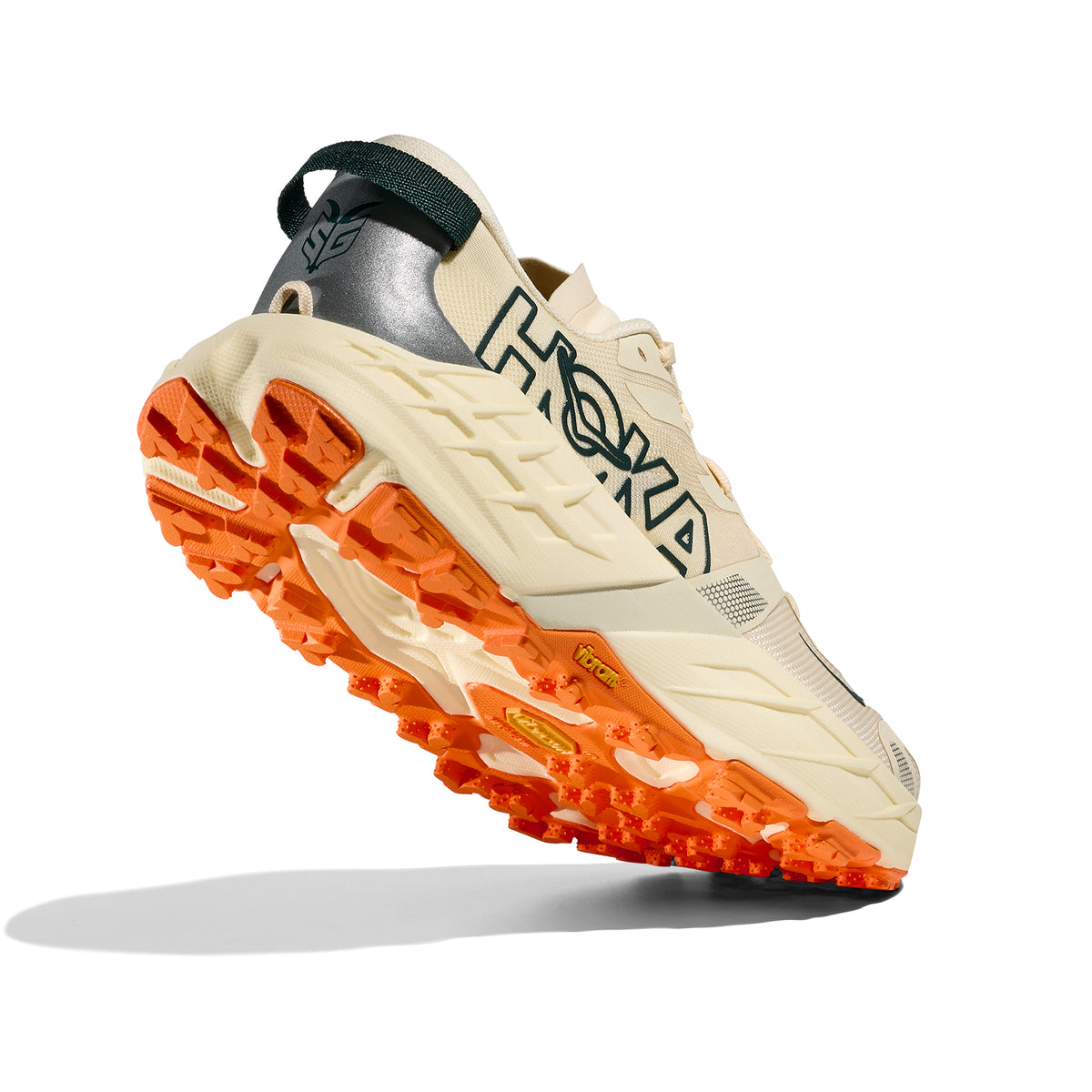 Men's Speedgoat 7 Trail Running Shoes Vintage Yellow Turmeric angled side view showing Vibram® Megagrip outsole with 5mm orange traction lugs