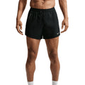 Men's Nike Stride Aero-FIT 5 Inch Shorts Black front view on male runner showing Aero-FIT jacquard knit with side pockets and elastic waistband for breathable comfortable daily training