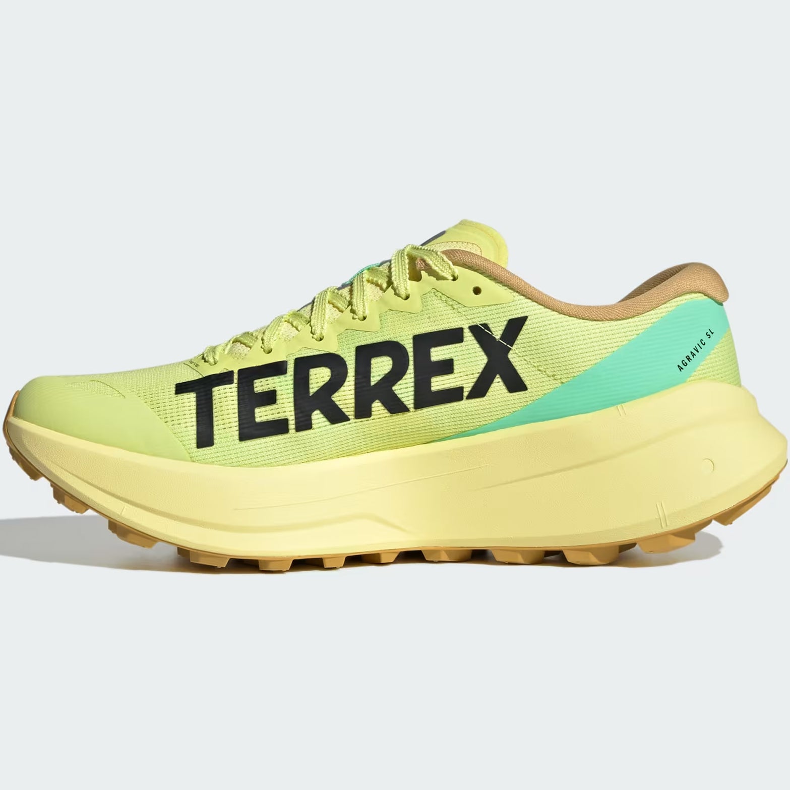 Men's adidas Terrex Agravic SL Trail Running Shoes Frozen Lemon Core Black Pulse Mint inner side view showing LIGHTSTRIKE PRO cushioning with wider platform and elastic tongue wings for secure trail fit