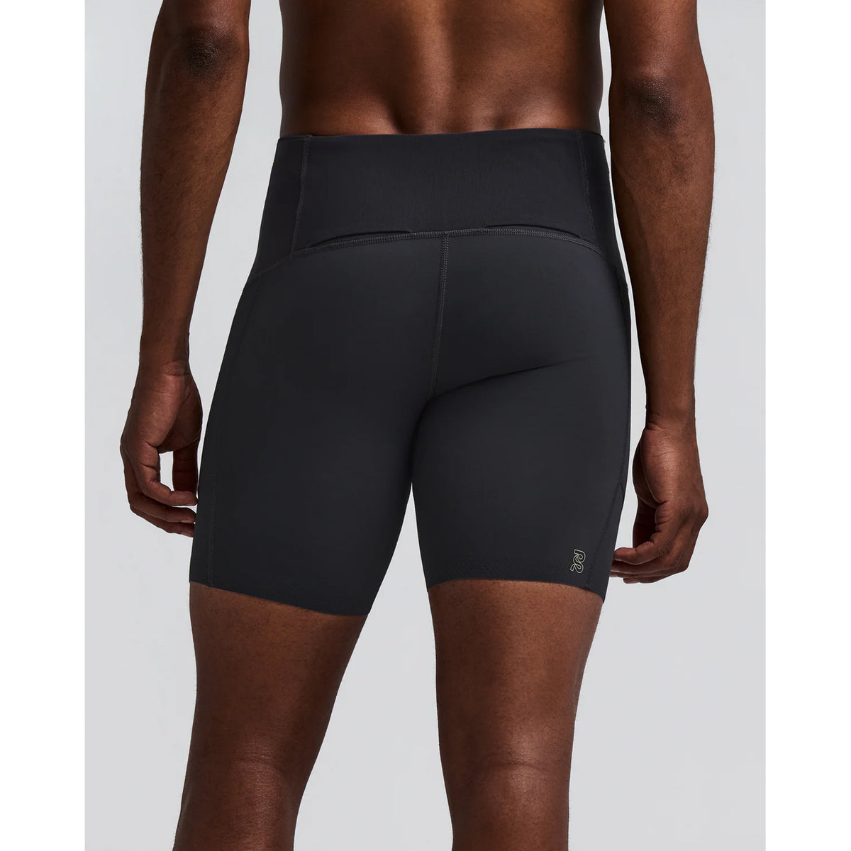 Men's Bandit Vanisher Quarter Tights Anthracite back view on male runner showing Powermesh back panel with four gel pockets, tee loop and hidden centre back phone pocket