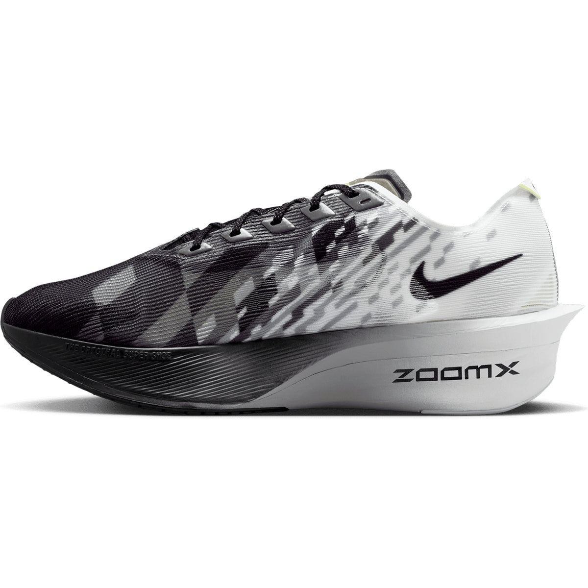 Introducing the Nike Men’s Vaporfly 4 SE Running Shoes in Black, White, and Smoke Grey—a sleek and modern racing shoe inspired by the iconic Vaporfly 4. Featuring a striking gradient pattern, a prominent Nike Swoosh logo, and “ZOOMX” text on its thick white foam sole, this shoe is engineered for speed with a carbon fibre Flyplate to enhance propulsion.