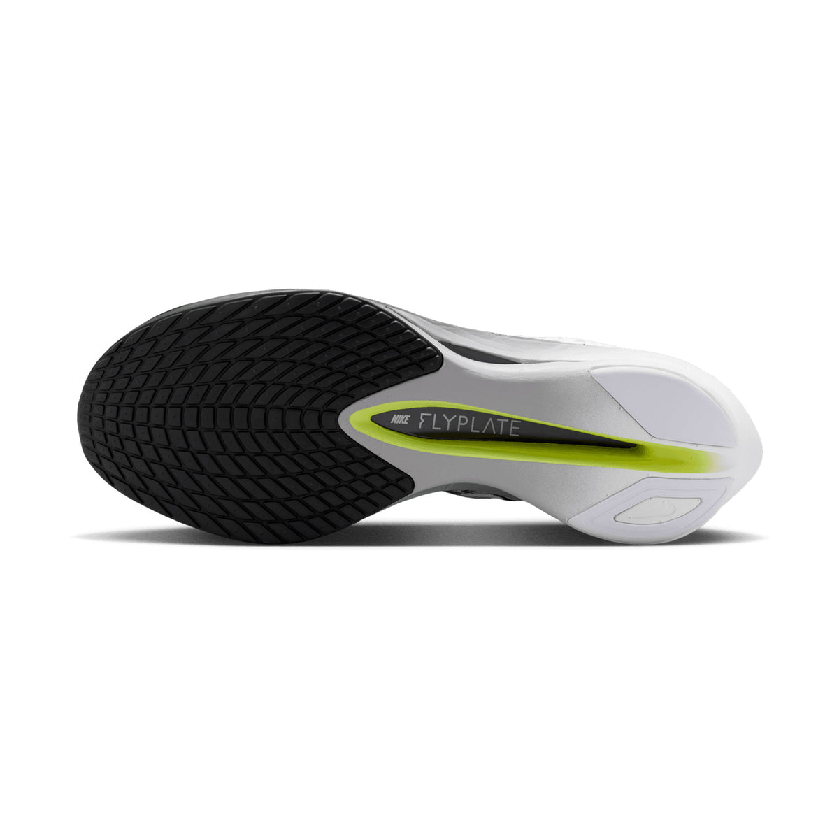 The bottom view of the Nike Men’s Vaporfly 4 SE Running Shoes in Black, White, and Smoke Grey showcases a black textured rubber sole with white edges and a neon green center stripe labeled “Flyplate,” emphasizing its innovative carbon fiber Flyplate technology.