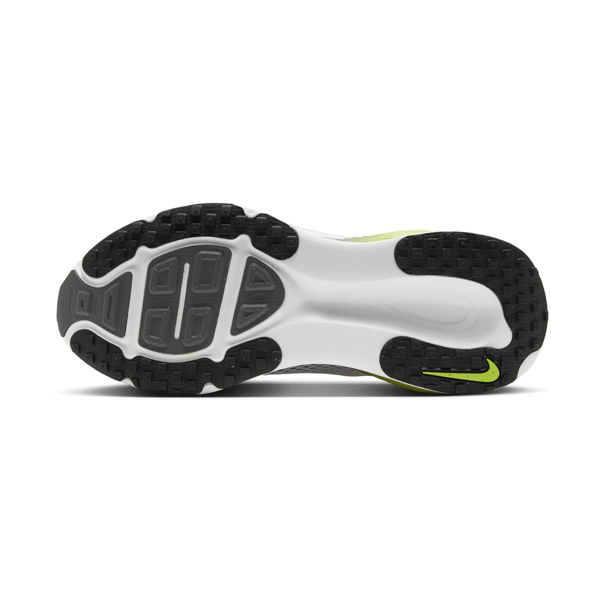 The image displays the rubber outsole of the Nike Men’s Vomero 18 Running Shoes in Photon Dust, Black, and Volt, showcasing a blend of textured tread patterns for optimal grip and flexibility. Designed by Nike as an everyday trainer, this model features dual-density cushioning to deliver enhanced comfort with every step.